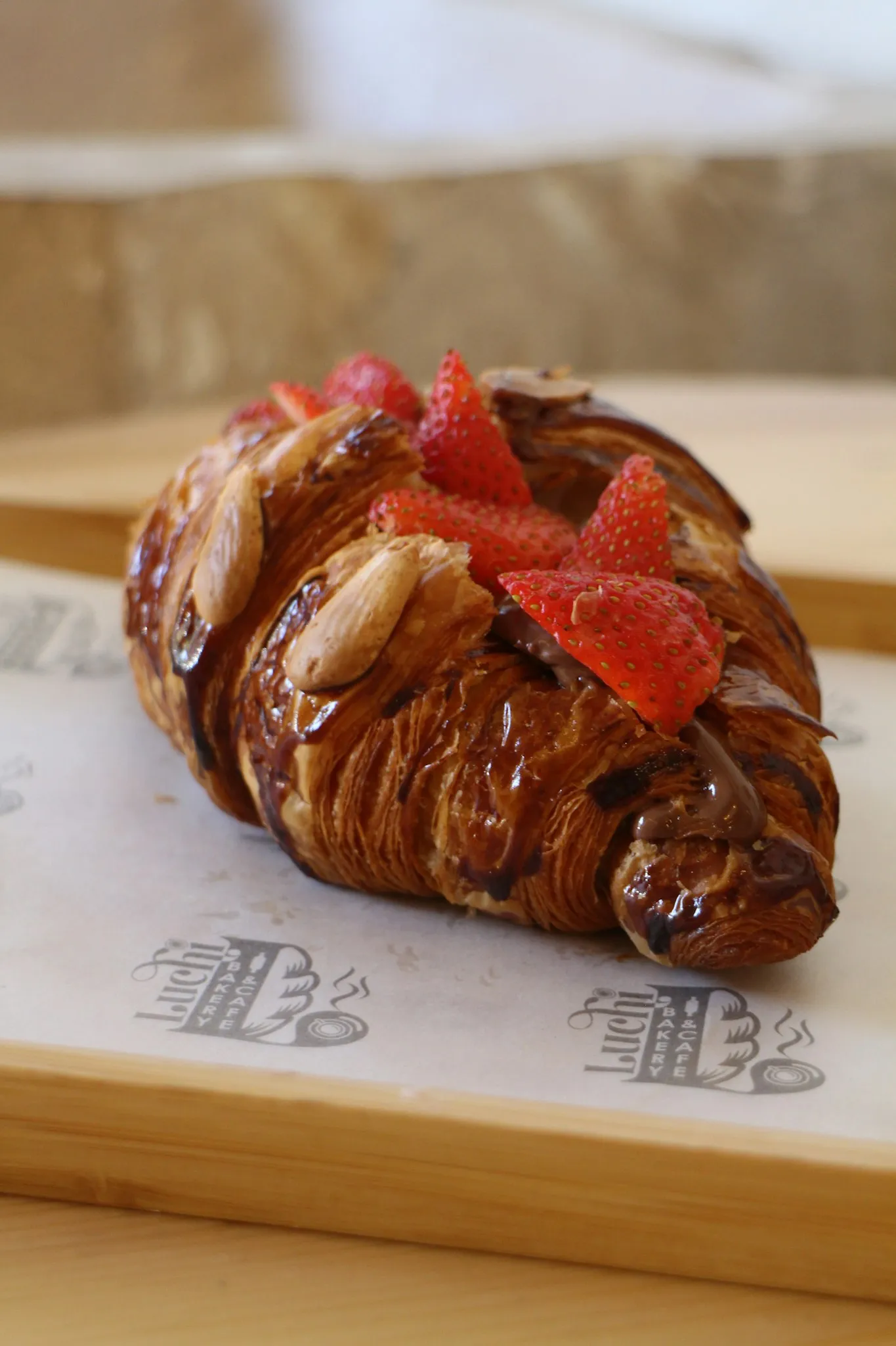 A pastry with strawberries on top of it